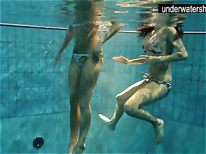 two stellar amateurs flashing their bods off under water